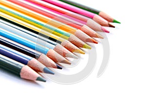 Set of color pencils on white