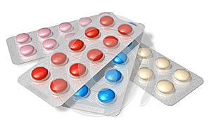 Set of color pills in blister packs photo