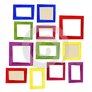 Set of color wooden frames on white background