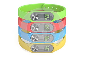 Set of colored activity trackers or fitness bracelets, 3D render