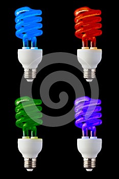 Set of colored CFL neon light bulbs isolated on black background
