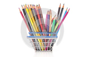 Set of colored pencils for drawing in the market basket. marketing in business sales