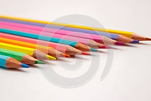 Set of colored pencils, school equipment on the table