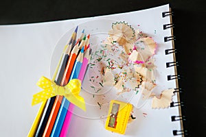 Set of colored pencils with sharpener and shavings