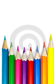 Set of colored pencils on a white background, concave arrangement