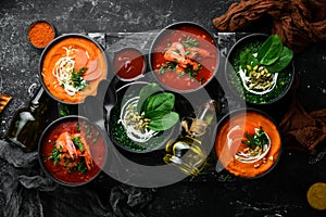 Set of colored soups. Spinach soup, tomato cream soup and carrot puree soup. Healthy food.
