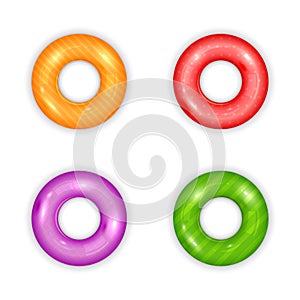 Set of Colored Swim Rings on White Background