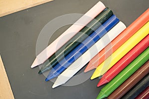 set of colored wax crayons