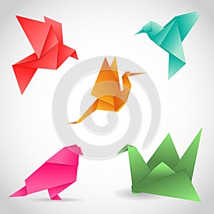 A set of 5 colorful birds made of paper in origami technique. Vector Image.