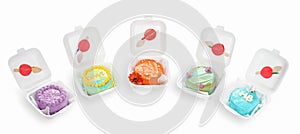 Set of colorful cakes in containers
