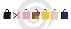 Set of colorful cloth bags and plastic bags with a red cross sign. Design element on white background.