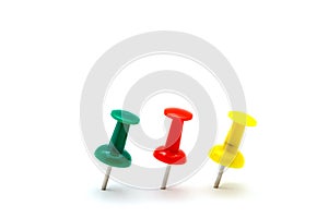 Set of colorful color push pins isolated on white background.