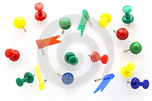 Set of colorful color push pins top view isolated on white background. photo