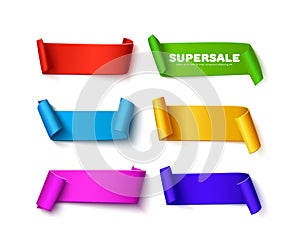 Set of colorful curved paper ribbon banners with rolls and space for text on white