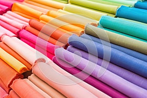 a set of colorful fabric swatches for espadrille manufacturing