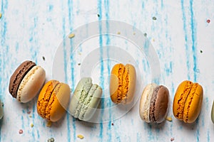 Set of colorful macaroons on light background