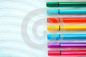 Set of colorful markers on the white