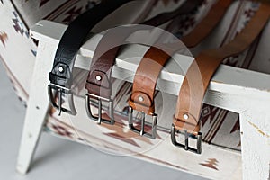 A set of colorful mens genuine sueded leather belts. fashion accessories photo