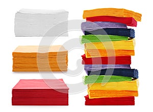 Set with colorful paper napkins on background