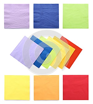 Set with colorful paper napkins on background, top view