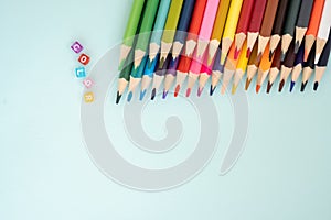 Set of colorful pencils on soft focus background. Back to school concept.