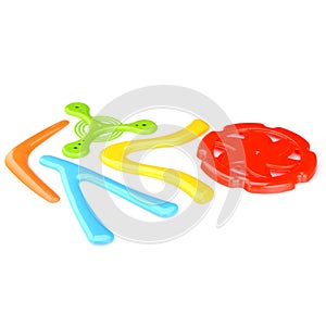 A set of colorful plastic boomerangs and frisbees for outdoor play. Children's active games. Boomerang isolated on a