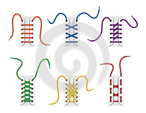 Set of colorful shoelaces untied and laced in holes with various methods or techniques