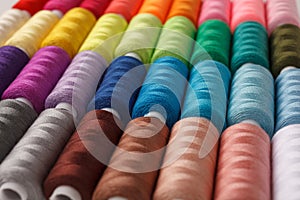 Set of colorful spools of thread