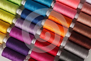 Set of colorful spools of thread