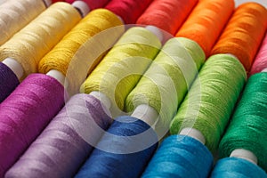 Set of colorful spools of thread