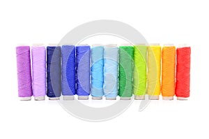 Set of colorful spools of thread