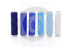 Set of colorful spools of thread