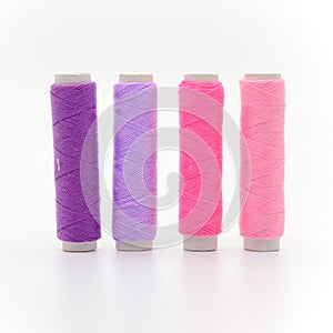 Set of colorful spools of thread