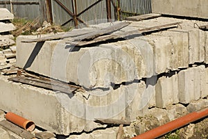 Set of concrete slabs and timber on the construction site