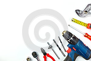 Set of construction tools on white background as wrench, hammer, pliers, socket wrench, spanner, tape measure, electric