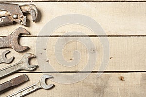 Set of construction tools. Wrench on wooden background