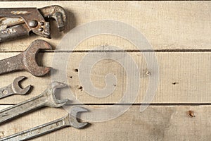 Set of construction tools. Wrench on wooden background