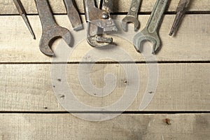Set of construction tools. Wrench on wooden background