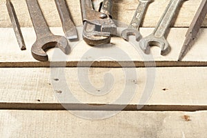 Set of construction tools. Wrench on wooden background