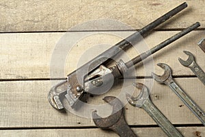 Set of construction tools. Wrench on wooden background