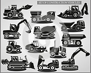 Set of construction vehicles in black and white