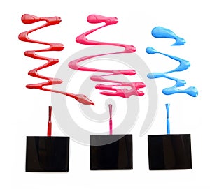 Set of cool multicolor nail brushes and dabs of polish isolated on white background. photo