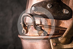 Set of copper pots and pans horizontal