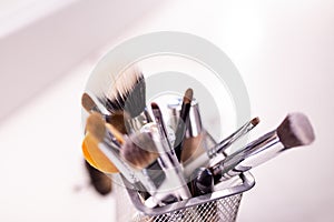 Set of a cosmetic brushes. Makeup brushes on a white background