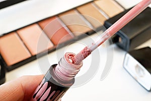 Set Of Cosmetic Makeup Products. Nail polish, mascara, lipstick, eye shadows, brush, powder, lip gloss