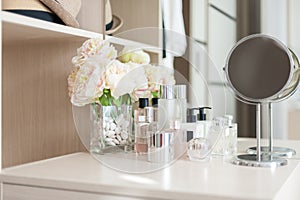 Set of cosmetic packaging on dressing table