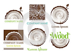 Set a cross section of the trunk with tree rings. Vector. Logo. Tree growth rings