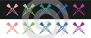 Set Crossed oars or paddles boat icon isolated on black and white background. Vector