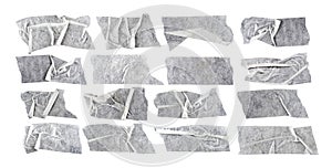 A set of crumpled strips of masking tape in various shapes and sizes. Masking tape isolated on white background