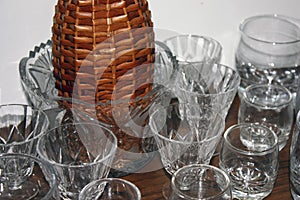 A set of crystal glasses, glasses on a shelf in a sideboard close-up